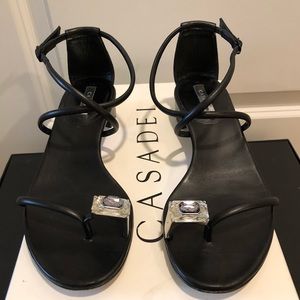 Elegant black leather sandals